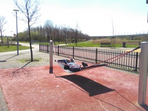 Sunbathing on the way to Dordrecht in hammock at a children's play area